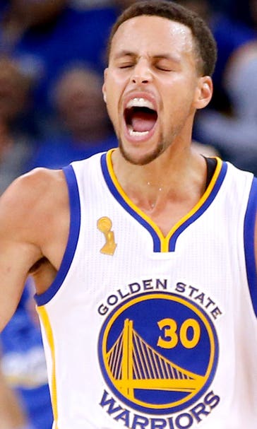 Champs raise banner, Curry rings in season with 40 in win